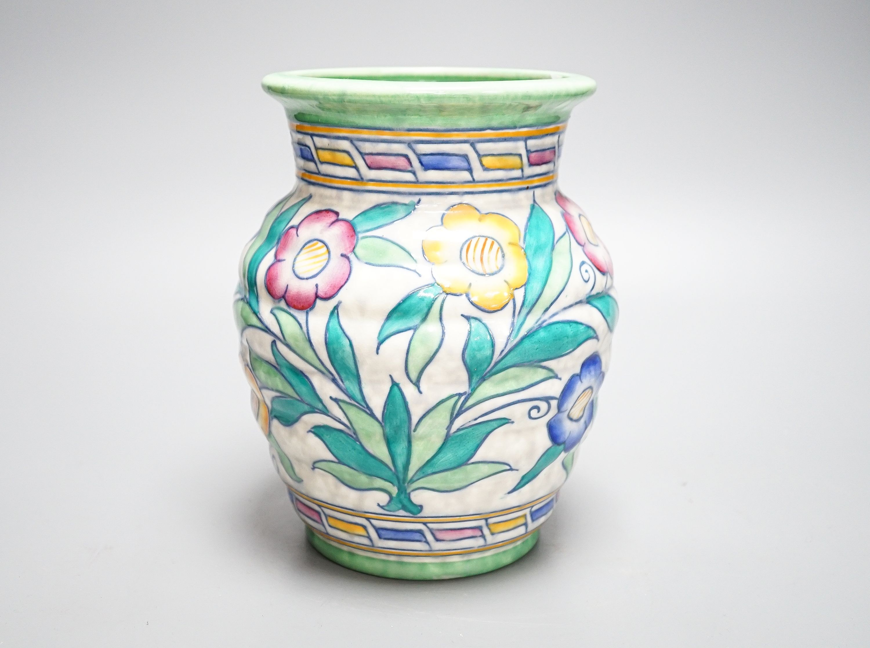 A Charlotte Rhead vase, painted with flowers in polychrome enamels, 20cm